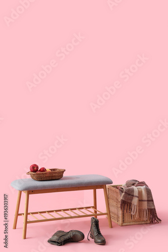 Soft bench with apples, sho...