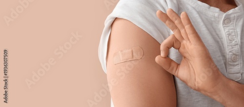 Young man with applied medi...