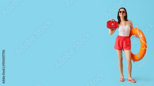 Female lifeguard with rescu...