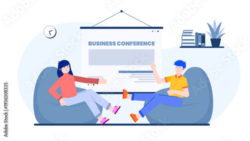 Two business people having a discussion during a conference event in a relaxed setting