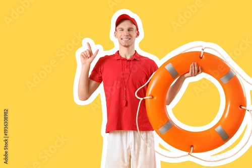 Male lifeguard with lifebuo...