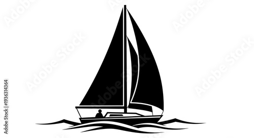 Silhouette of a sailboat on the water.