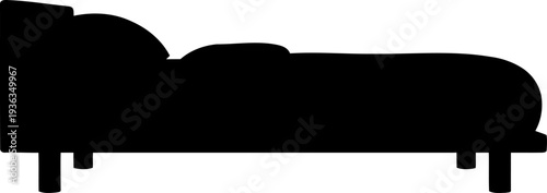 Low profile platform bed with pillows and duvet silhouette