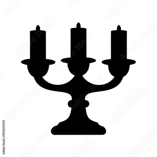 Silhouette of a classic three candle candelabra evoking ambiance and tradition