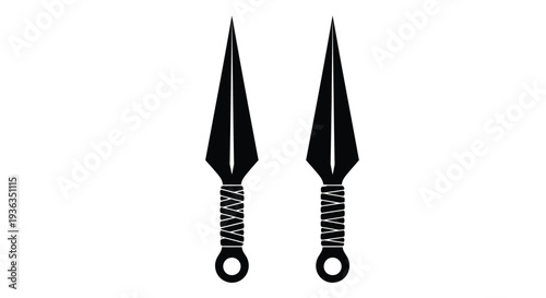 Two black throwing knives with ornate handles displayed on a white background