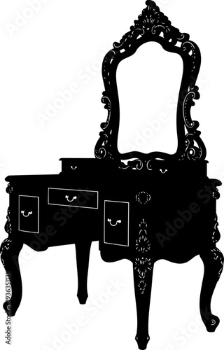 Vintage vanity table silhouette with a decorative carved mirror