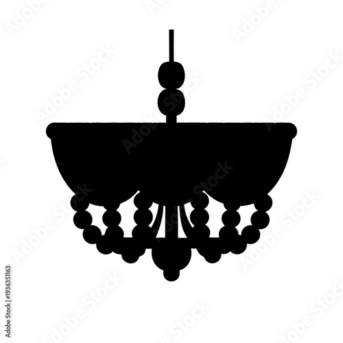 Silhouette of an ornate chandelier with bead accents, a vintage lighting fixture