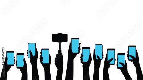 A crowd of hands holding up illuminated smartphones capturing a moment