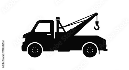 A stark black silhouette of a classic tow truck complete with boom and hook silhouette high quality professional