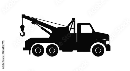 A stark black silhouette depicts a tow truck with a visible hook and cab silhouette high quality professional