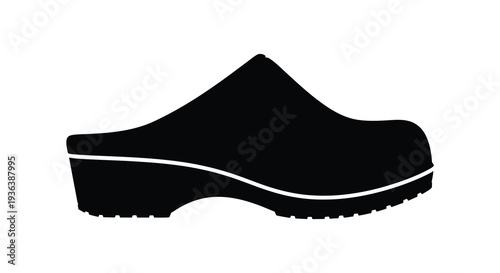 A stark black profile of a single clog shoe against a white background a bold silhouette high quality