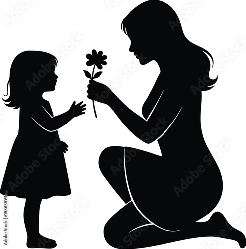 Silhouette of a woman kneeling and giving a flower to a little girl