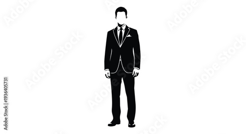 A man in a black suit and tie standing alone