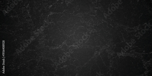 Dark charcoal grunge wall texture background. Dark black rough grunge surface with smoke edge. Black texture chalk board and black board.