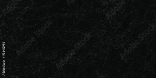 Dark charcoal grunge wall texture background. Dark black rough grunge surface with smoke edge. Black texture chalk board and black board.