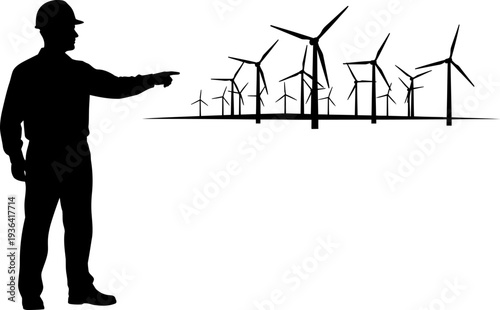 Engineer pointing towards wind turbines in a renewable energy field