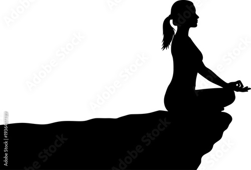 Female silhouette practicing yoga on mountain peak edge