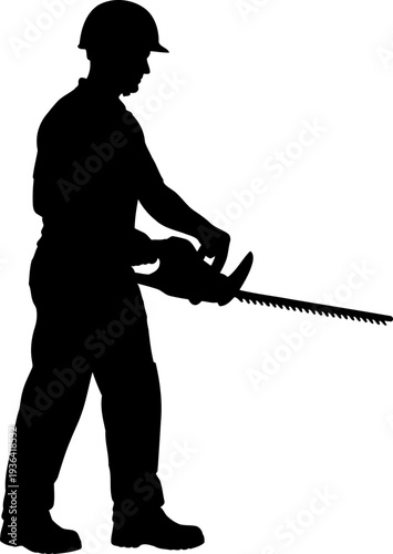 Professional groundskeeper holding a chainsaw for landscape maintenance