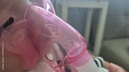 Give the child medication using a nebulizer for treatment.