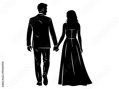 Couple walking hand in hand in formal attire on a romantic evening outdoors