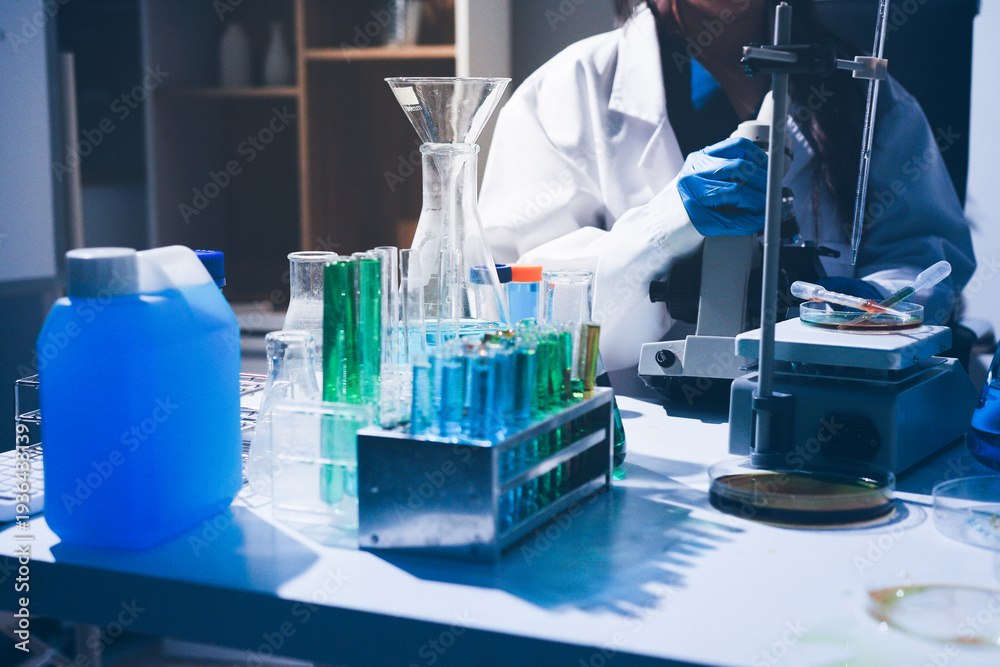 Fototapeta premium Science, laboratory and woman with pipette, test tube and biotech solution in research. Medical innovation, scientist or lab technician in study for healthcare, medicine and vaccine results feedback.