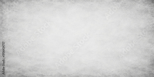 Textured grunge background offers a versatile backdrop for design projects, evoking a sense of history and depth. The soft, textured surface creates a visually rich and adaptable space for text.