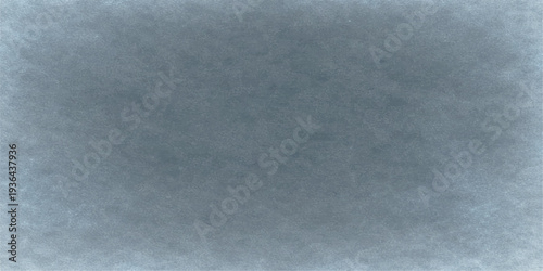 Abstract a minimalist study of a textured gray surface. The subtle variations in tone create a sense of depth and visual interest, hinting at a world of unseen details.