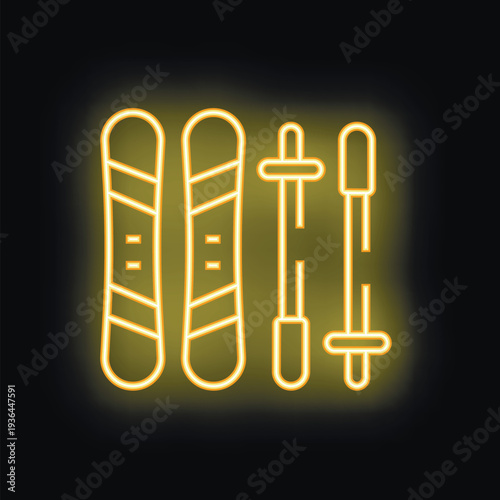 Yellow neon sign of snowboard and ski equipment glowing on a black background