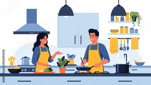 Happy young couple preparing a meal together in a stylish and well-equipped modern kitchen with blue cabinets and various cooking utensils.