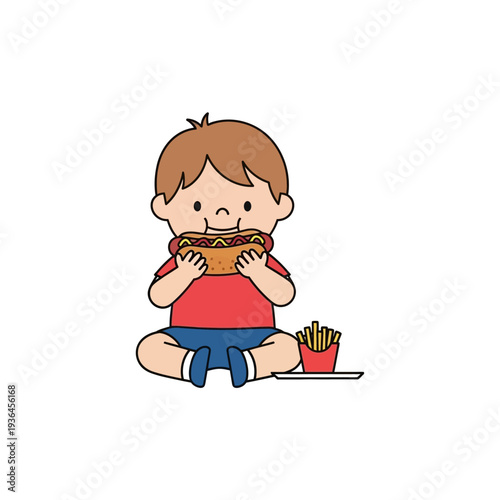 Cute boy eating a hot dog and french fries, happy childhood meal
