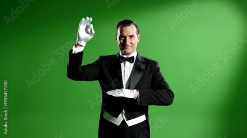 Man in Tuxedo Juggles Plates with Skill and Precision