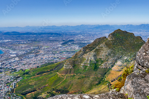 Scenic aerial panorama of Cape Town city bowl, harbor,  Lion's Head and Table Bay viewed from Table Mountain, South Africa.