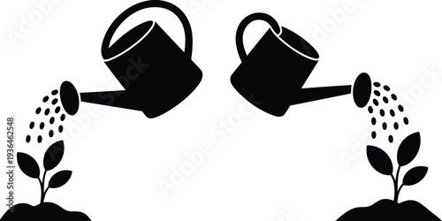 Two black watering cans pouring water on plants 1