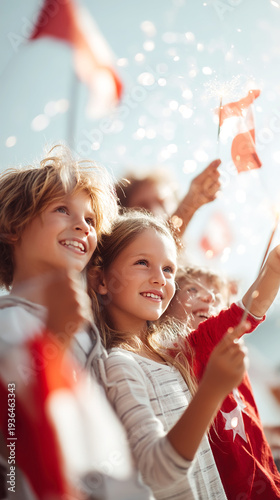 Wallpaper Mural Happy children holding flags celebrating outdoor festival in vertical composition. Joyful emotions and community spirit, background for education, parenting, events and social campaigns. Torontodigital.ca