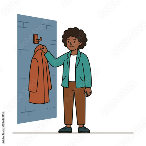 Smiling student hanging coat on wall hook in school hallway daily routine concept