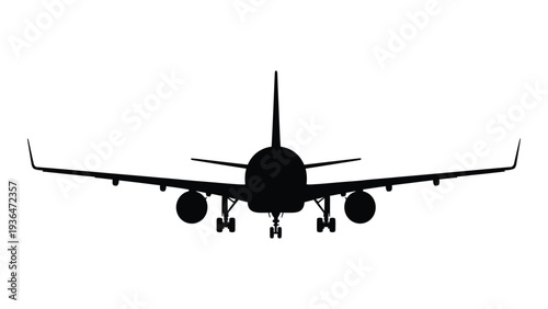 A black silhouette of a commercial airplane flying