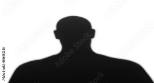 Silhouette of a man against a white background.