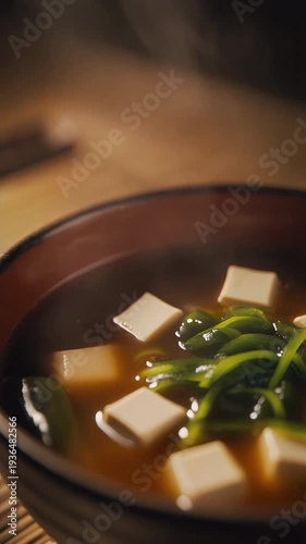 Steaming Traditional Miso Soup Macro Closeup on Rustic Wooden Tabletop in Minimalist Japanese Kitchen