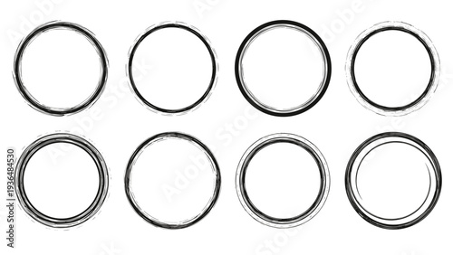Collection of eight black hand-drawn circular frames with a sketchy and textured aesthetic for use in graphic design and artistic projects.