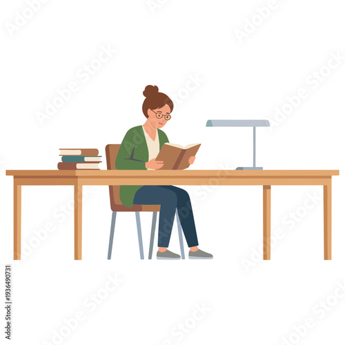 Woman sitting at desk reading book under lamp with stack