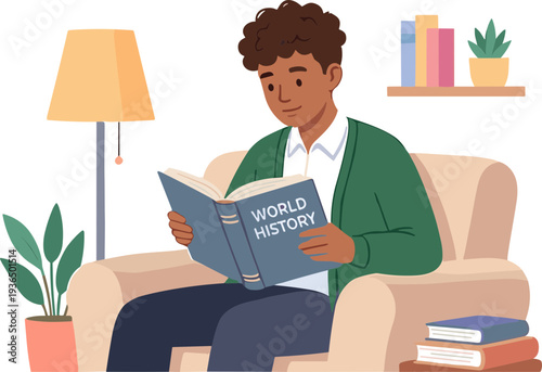 A young man sits on a sofa reading a book about world history indoors.