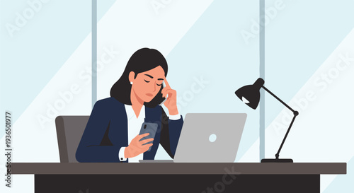Woman feeling stressed and overwhelmed while working at her desk with a laptop and phone in a modern office environment