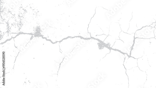 Cracked white surface with grey lines and speckles