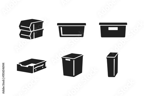Collection of black storage containers and organizers on a white background