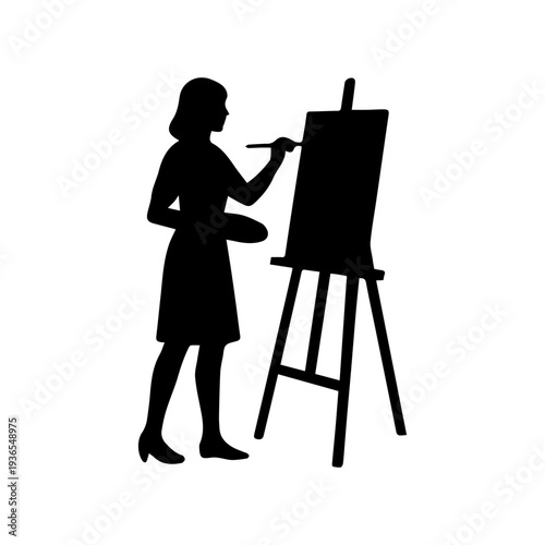 Female artist silhouette painting a canvas on an easel