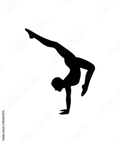 Female silhouette showing flexibility and balance through a demanding handstand dance move