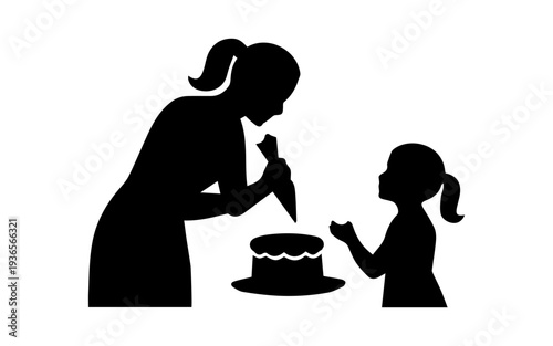Mother and daughter decorating cake with icing
