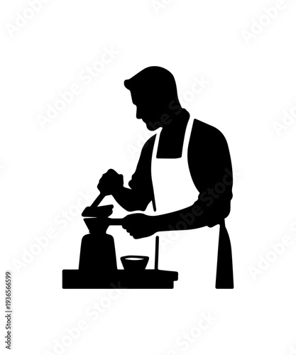 Chef in apron preparing food with cooking tools