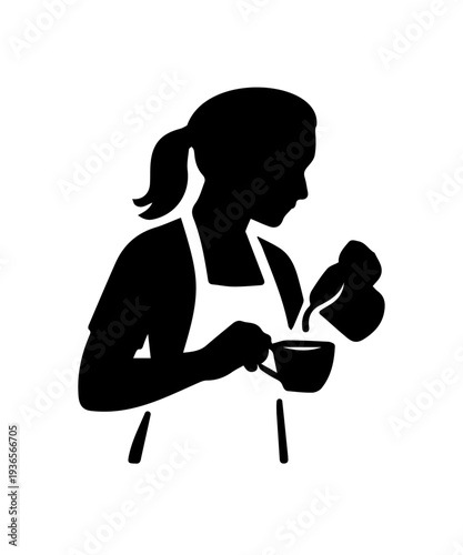 Barista making latte art pouring milk into coffee