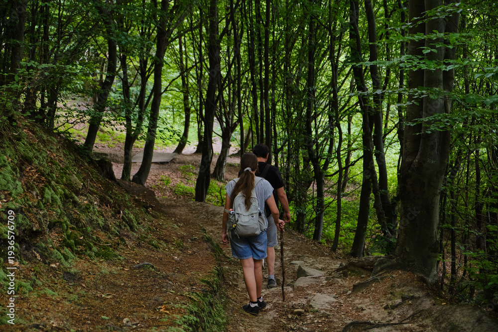 Fototapeta premium Father and Daughter Forest Hike
